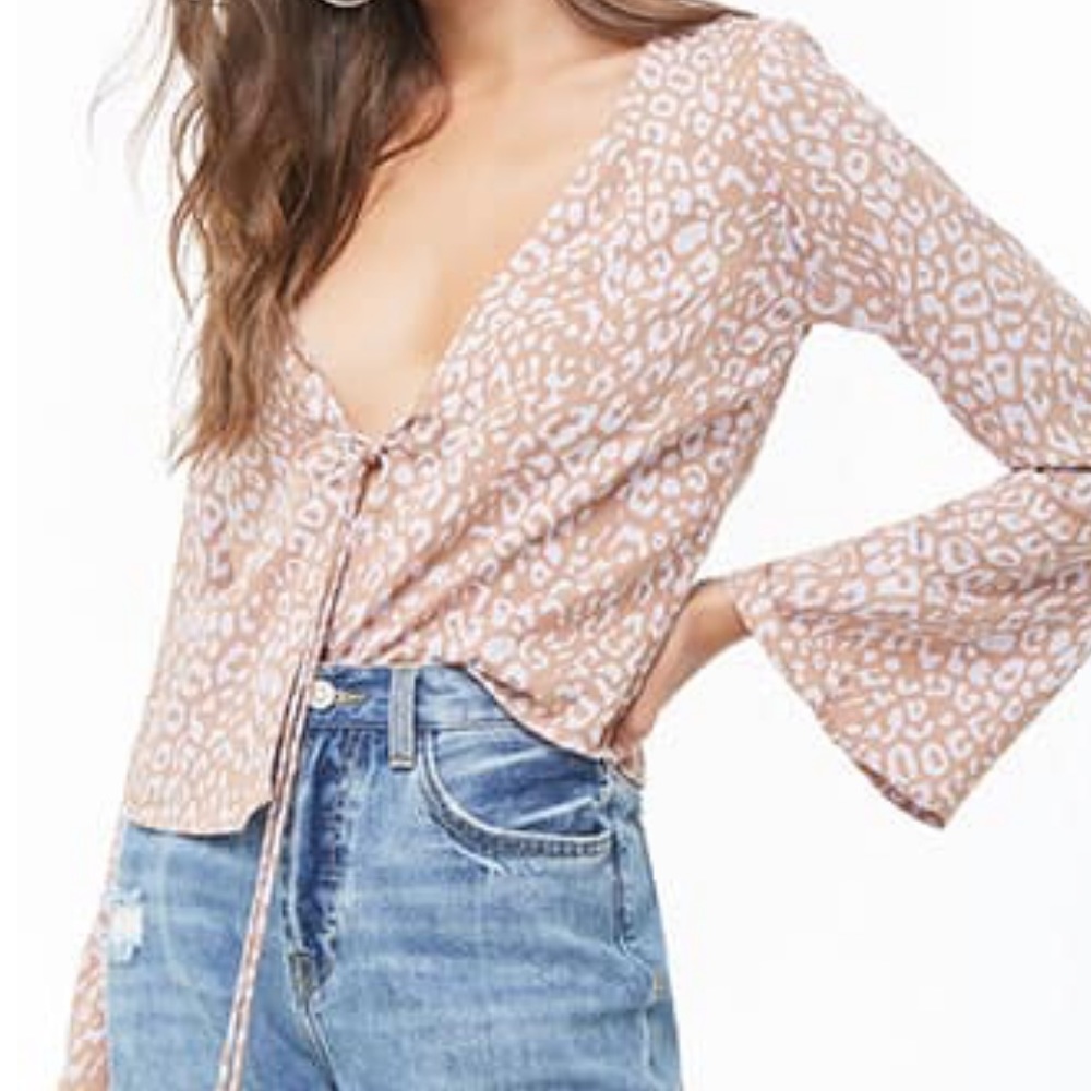 Motel leopard tie top